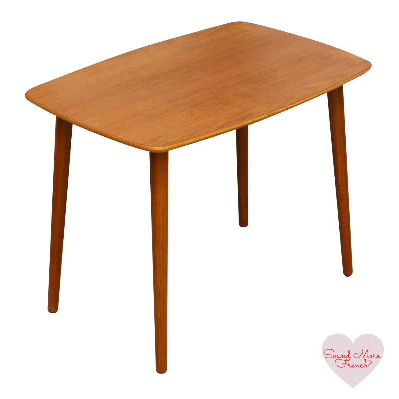 wooden_four_legged_table_on_white_background_with_sound_more_french_logo